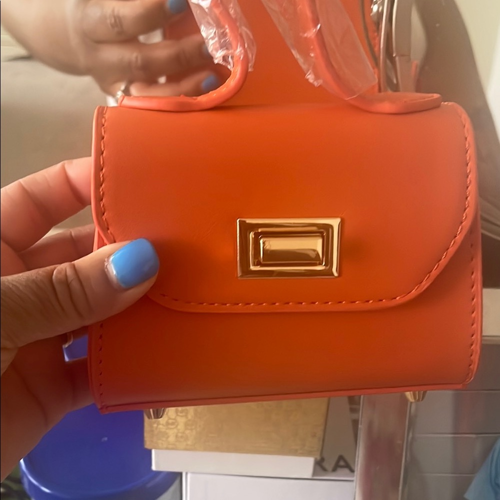 Orange Handbag with Gold Accent